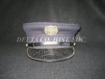 Fireman's cap worn by Escanaba firefighter Nick Wagner in the 1910's-30's