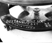 Base of Fresnel lens with maker's inscription