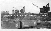 Hoisting Clams on Coal Dock, Gladstone