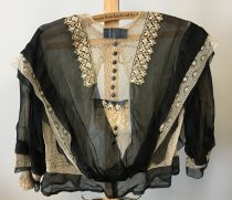 Woman's black and ivory silk and lace blouse