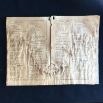 Catalogue opened to a random page, showing prices of various merchandise