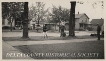 Taking down large tree on 12th Street, 3