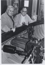 George Embs and Sheldon Cobb with motor launch