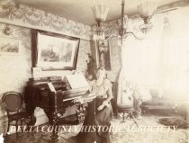 Hattie VanDyke Farrell in her parlor