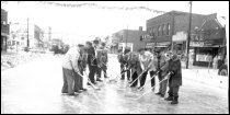 Merchants in the 1200 block of Ludington Street on Big Ole's Ice Rink