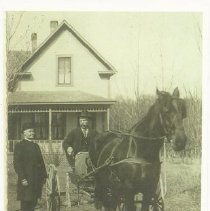 Joseph L'Huillier on a carriage