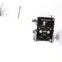 Hero Honkavaara and his car in a snowstorm in the late 1920s
