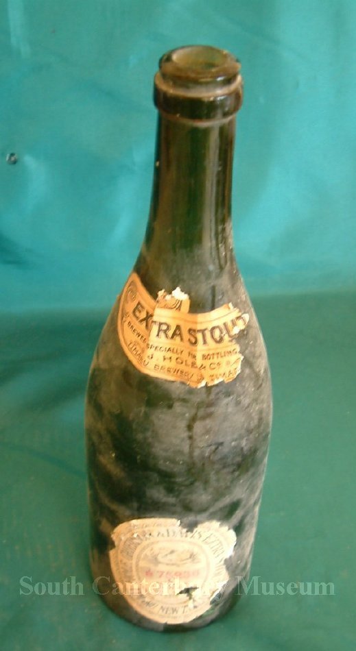 Bottle, Drink Large green glass bottle from J. Hole & Co., Timaru