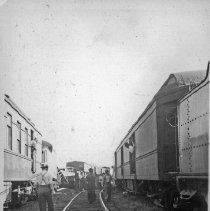 Men walking track. Southern Railroad wreck.
