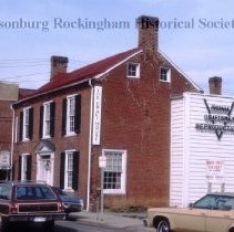 The Craft House with Grand movie theatre behind it.