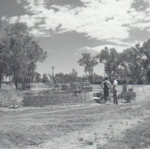 Gallup Park flower garden, construction of Solar III, sculpture by Edgar Br