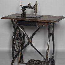 Howe, treadle sewing machine belonging to Mr. & Mrs. Fred Comstock; c.1858