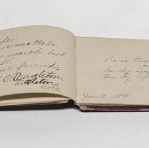 Autograph album containing Littleton girls' signatures, open; 1888-1894