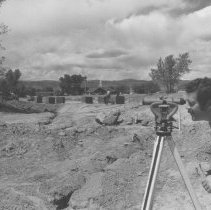 Unidentified man surveying, construction of Gallup Park, Summer, 1976