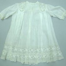 Infant's gown with lace neck, cuffs, hem; lace insets in shoulders; c.1900