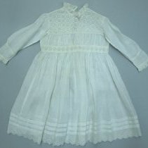 Infant's gown with embroidered neck, yoke, gathered band, and cuffs; c.1900