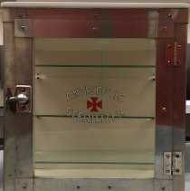 Autoclave cabinet with glass shelving; 1945.