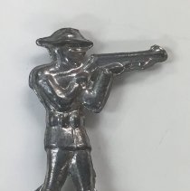 Toy lead soldier holding rifle; c.1918.