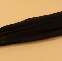 Black silk parasol with wood and silver handle.