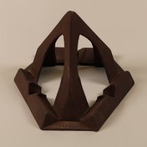 Six-sided sadiron trivet with space for three irons.