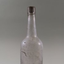 Glass bottle, verso