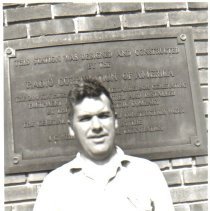 Man in front of Marconi Plaque