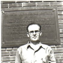 Man in front of Marconi Wirele