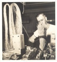 Nelson Richard, sewing broom corn tassels together