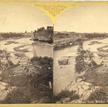 435. Down the River from the Bridge. Glens Falls.