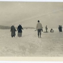 Postcard of People Walking with Toboggan