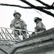 CHief Nash and Lt. Coss on Norwood Street Roof