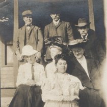 Seven people on the steps