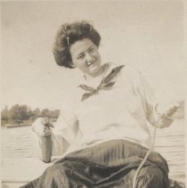 Woman holding an oar