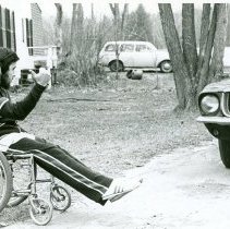 UNIDENTIFIED MAN HITCH HIKING IN WHEELCHAIR