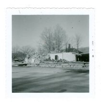 DEMOLITION OF TWIN MT. HOUSE