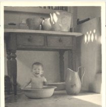 Loan Pol in her bath, Winchell Home, Panang