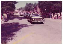 Cars parading in 1976