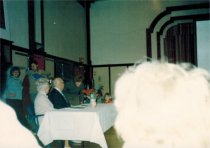 Vliet autographing book