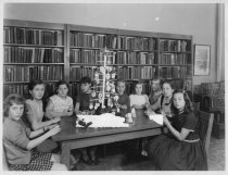 Group of girls making puppets