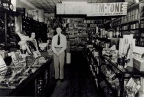 Bob Peterson standing in his hardware and paint store