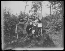Party on steps of wagonette, photo by Alice Austen, 1891
