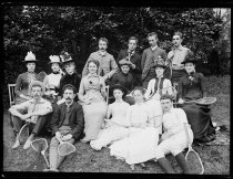 Large group on tennis ground, photo by Alice Austen, 1886