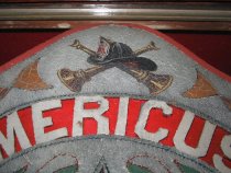 detail, helmet and trumpets