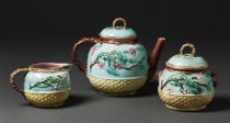 sugar bowl (at left) with cream pitcher and teapot