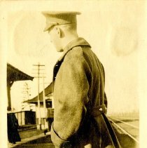 Egerton Sayers standing at the railway station