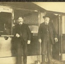 E. H. Barnes and George Warfield Standing in Farmer's and Mechanics Bank