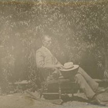 Man Sitting in Chair