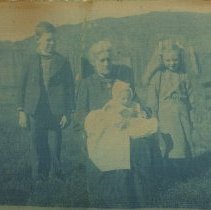 Cloth photo of woman & three children