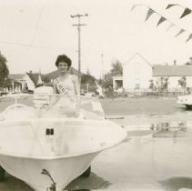 Karen Clary with Outboard Motorboat