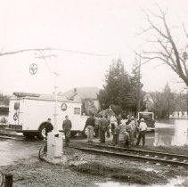Civil Defense Truck at Railroad Crossing